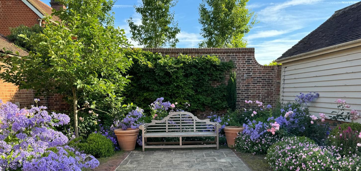 garden bench and flowers